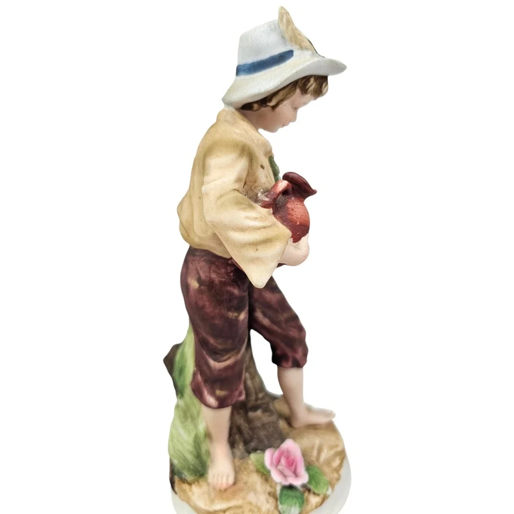 Andrea by Sadek Vintage Porcelain Boy Figurine with‎ Water Jug and Feather Hat